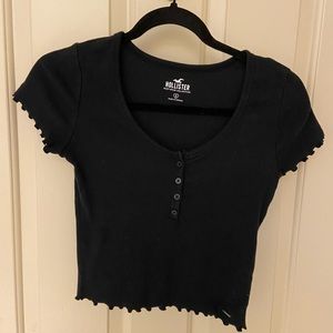 Black Hollister Tee with four buttons Size Small